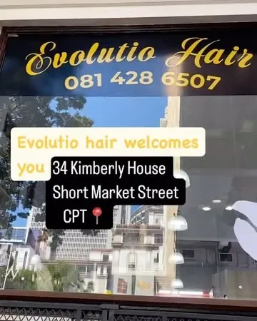 The Evolutio Hair sign above the entrance at 34 Shortmarket Street