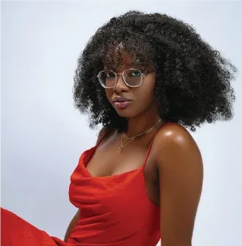 A defined curly afro