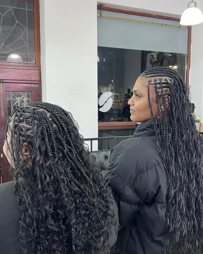 Knotless braids with curled ends, seen from the front and the back