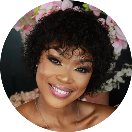 A curly pigtail style dressed with flowers